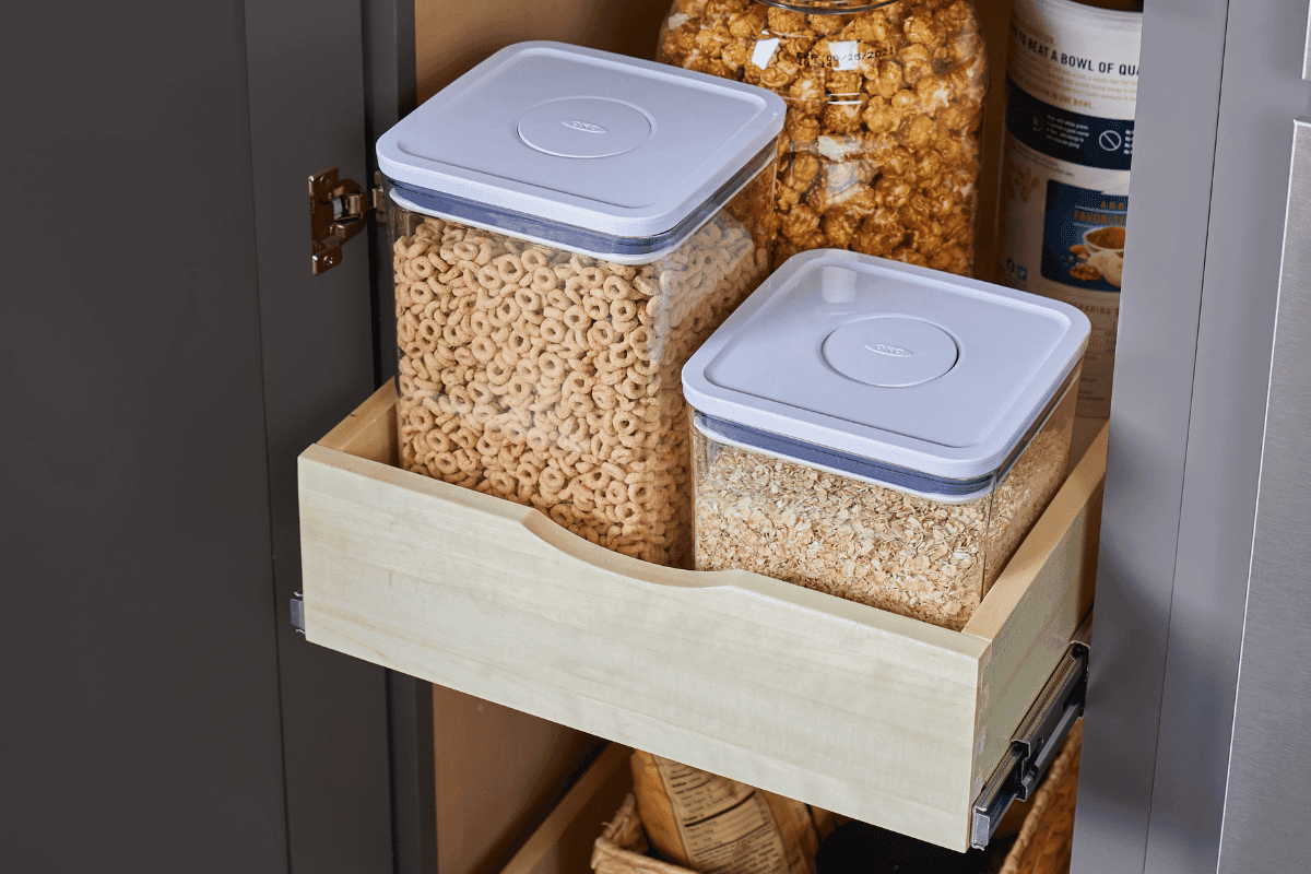 Slide out drawers in a kitchen panty cabinet.